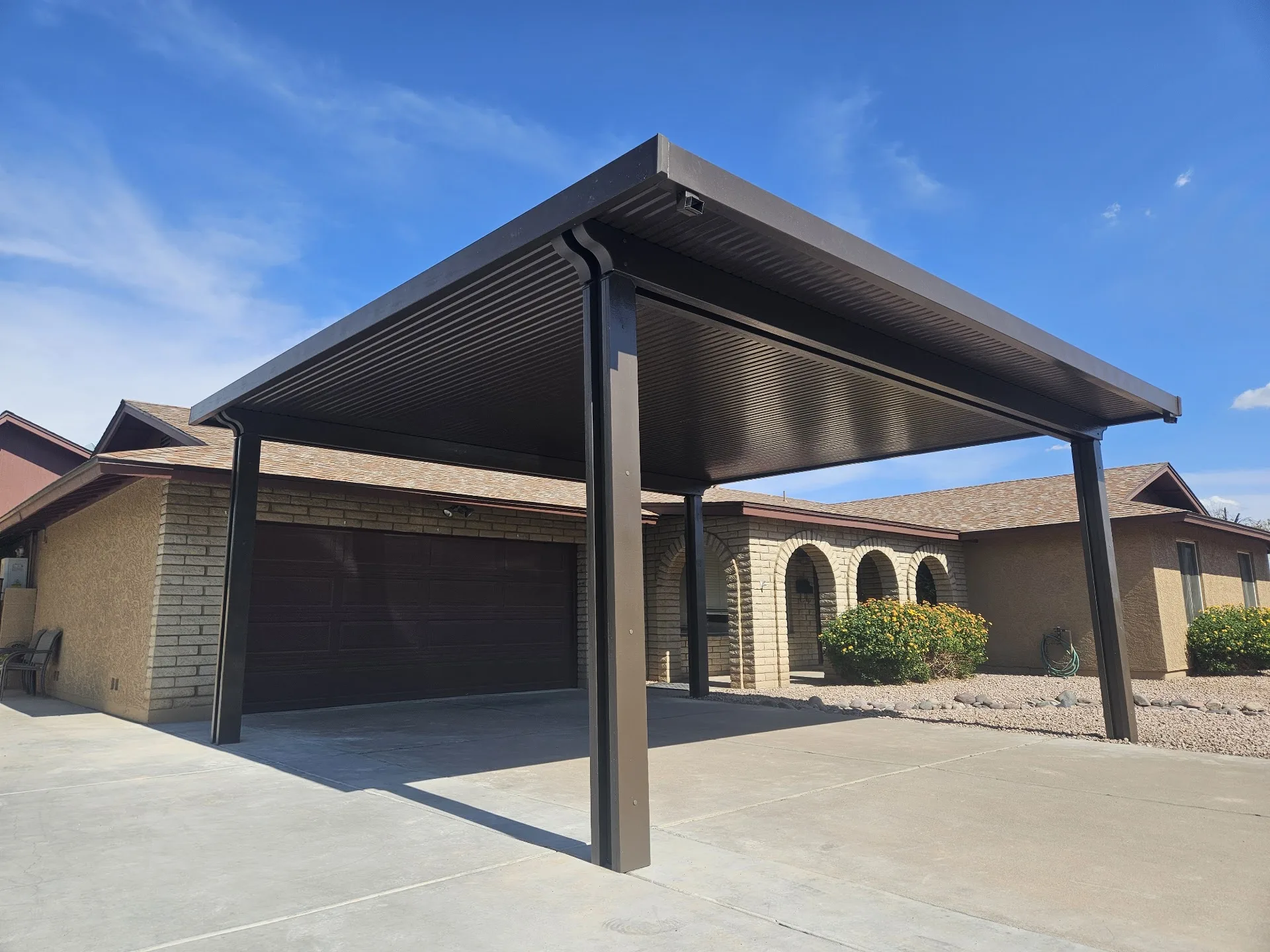 Motorized exterior shades on a covered Arizona patio